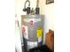Efficient Rheem water heater with visible energy guide for cost savings and reliability at 12002 Sw 137Th Loop, Dunnellon, FL 34432