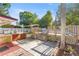 Multi-level backyard deck with a pergola, wooden stairs, and a tropical feel at 12351 Se Hwy 464, Ocklawaha, FL 32179