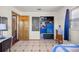 This bedroom features a closet with organizers, and access to other rooms, offering functionality and style at 12351 Se Hwy 464, Ocklawaha, FL 32179