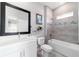 Modern bathroom features a soaking tub, tiled shower, vanity and neutral color palette at 13423 Sw 48Th Ave, Ocala, FL 34473