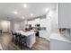 Bright kitchen features recessed lighting, a center island with seating, and updated stainless appliances at 13423 Sw 48Th Ave, Ocala, FL 34473
