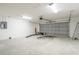 Spacious two car garage with plenty of room for parking and storage at 13588 Se 102Nd Ct, Belleview, FL 34420