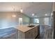 Gourmet kitchen featuring stainless appliances, a large island, and plenty of space for entertaining guests at 13588 Se 102Nd Ct, Belleview, FL 34420