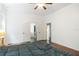 Spacious bedroom with wood floors and double doors leading to a walk-in closet at 16295 W Highway 40, Ocala, FL 34481
