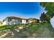 Beautiful backyard offering green grass and a view of the home's exterior at 16299 Sw 14Th Avenue Rd, Ocala, FL 34473