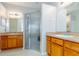 Bright bathroom with double sinks, walk-in shower, and ample counter space at 16299 Sw 14Th Avenue Rd, Ocala, FL 34473