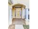 Covered front porch with decorative columns and elegant entryway at 16299 Sw 14Th Avenue Rd, Ocala, FL 34473