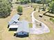 Sprawling rural property showcasing the home, a gazebo, and fenced pastures at 1711 Sw 63Rd St Rd, Ocala, FL 34476
