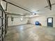 Spacious garage with utility connections and side door access at 1711 Sw 63Rd St Rd, Ocala, FL 34476