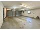Spacious two-car garage with concrete flooring and good lighting at 1711 Sw 63Rd St Rd, Ocala, FL 34476