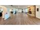 Open floor plan features a stone fireplace, barn door, and open layout at 1711 Sw 63Rd St Rd, Ocala, FL 34476