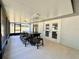 Enclosed patio with table and chairs at 1711 Sw 63Rd St Rd, Ocala, FL 34476
