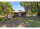 Exterior of a small barn with fenced in area at 18695 Ne 5Th Terrace Rd, Citra, FL 32113