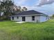 Backyard with grass at 203 Locust Pass, Ocala, FL 34472