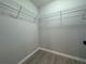 Walk-in closet featuring wire shelving at 203 Locust Pass, Ocala, FL 34472