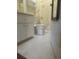 Cozy bathroom featuring a toilet, vanity, and patterned shower curtain at 2127 N.E. 40Th Ave., Ocala, FL 34470