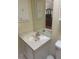Bathroom featuring a single sink vanity and mirrored cabinet at 2127 N.E. 40Th Ave., Ocala, FL 34470