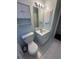 Bathroom featuring a single sink vanity, mirrored cabinet, and toilet at 2127 N.E. 40Th Ave., Ocala, FL 34470