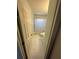 Bright bathroom with a shower-tub combo, white tile flooring, and neutral wall paint at 2127 N.E. 40Th Ave., Ocala, FL 34470
