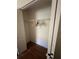 A reach in closet with a shelf and a few hangers at 2127 N.E. 40Th Ave., Ocala, FL 34470