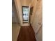 Inviting entryway with tiled floor, security door, and convenient access to other areas at 2127 N.E. 40Th Ave., Ocala, FL 34470