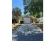 Cozy single-Gathering home featuring an attached two-car garage and mature landscaping at 2127 N.E. 40Th Ave., Ocala, FL 34470