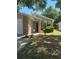 Charming home with brick accents, mature landscaping, and a well-maintained lawn at 2127 N.E. 40Th Ave., Ocala, FL 34470