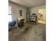 Spacious garage featuring a water heater, storage shelving, and a laundry area for convenience at 2127 N.E. 40Th Ave., Ocala, FL 34470