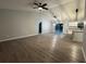 Spacious living room featuring luxury vinyl flooring and an open floor plan at 227 Locust Rd, Ocala, FL 34472