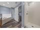 The bathroom has a separate tiled shower, bathtub, and modern fixtures at 2312 Sw 140Th Ct, Ocala, FL 34481
