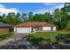 Beautiful single-story home with a well-maintained lawn and inviting curb appeal at 2312 Sw 140Th Ct, Ocala, FL 34481