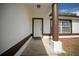 Inviting front porch with decorative column and charming 'Hello' doormat at 2312 Sw 140Th Ct, Ocala, FL 34481
