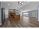 Modern kitchen with stainless steel appliances and breakfast bar open to living room at 2312 Sw 140Th Ct, Ocala, FL 34481