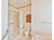 Bright bathroom featuring a walk-in shower and convenient accessibility handrails at 2339 Nw 55Th Avenue Rd, Ocala, FL 34482