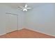 Bedroom with wood-look floors, large closet, and neutral walls at 2339 Nw 55Th Avenue Rd, Ocala, FL 34482