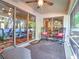 Covered porch featuring a seating area with rocking chairs at 2410 Se 23Rd Pl, Ocala, FL 34471