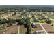 A high altitude view of the community, which has a variety of homes, landscaping, and nearby open space at 2515 Se 77Th St, Ocala, FL 34480