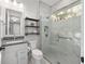 Elegant bathroom with glass shower and modern vanity, a spa-like retreat with luxury finishes at 2515 Se 77Th St, Ocala, FL 34480