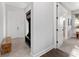 Entryway featuring a coat rack, wood bench, and access to other rooms of the house at 2515 Se 77Th St, Ocala, FL 34480