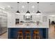 Bright kitchen featuring an island with bar seating and stainless steel appliances at 2515 Se 77Th St, Ocala, FL 34480