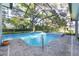 A private screened-in swimming pool and integrated spa offers backyard relaxation at 2515 Se 77Th St, Ocala, FL 34480