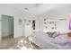 Bright bedroom features a walk-in closet, carpeted floors, and soft, pastel colors that create a calm ambiance at 4083 Se 38Th Loop, Ocala, FL 34480