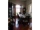 Charming dining room with wood floors, furniture and decor at 4770 Sw 114Th St, Ocala, FL 34476