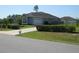 Charming single-story home featuring an attached garage and well-manicured landscaping at 4770 Sw 114Th St, Ocala, FL 34476