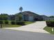 Charming single-story home featuring an attached garage and well-manicured landscaping at 4770 Sw 114Th St, Ocala, FL 34476