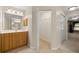 Bathroom vanity and walk-in closet at 4939 Sw 99Th Pl, Ocala, FL 34476