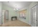 Inviting dining area featuring tile floors, soft colors, and a charming chandelier at 4939 Sw 99Th Pl, Ocala, FL 34476