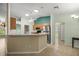 Bright kitchen with stainless steel appliances and a breakfast bar at 4939 Sw 99Th Pl, Ocala, FL 34476