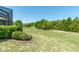 Expansive backyard with lush greenery, a gazebo, and ample space for outdoor activities at 6045 Ne 65Th St, Silver Springs, FL 34488