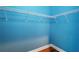 Empty walk-in closet with white wire shelving and wood flooring at 6045 Ne 65Th St, Silver Springs, FL 34488